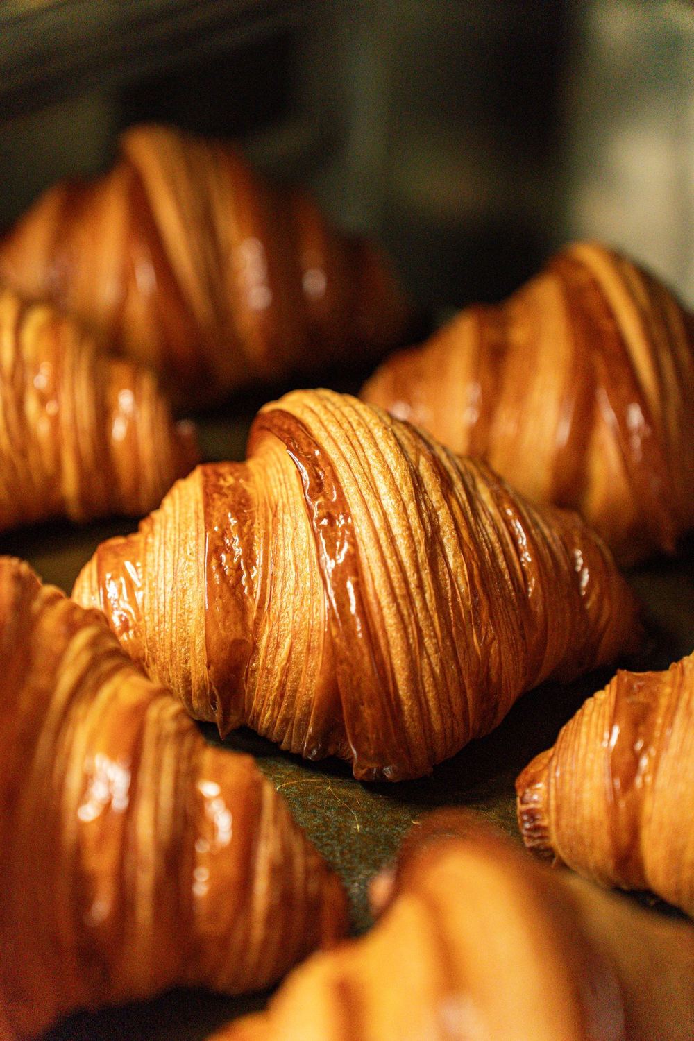 A tray of golden croissants